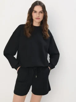 MOHITO Bawełniana czarna bluza z ozdobnymi elementami czarny Outlet