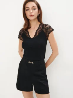 MOHITO Czarna bluzka z koronkowymi wstawkami czarny Fashion