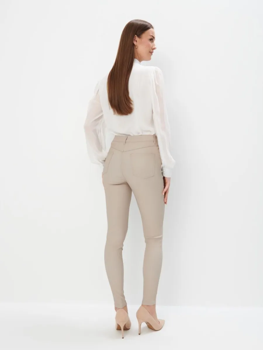 MOHITO Woskowane spodnie skinny beu017cowy Online